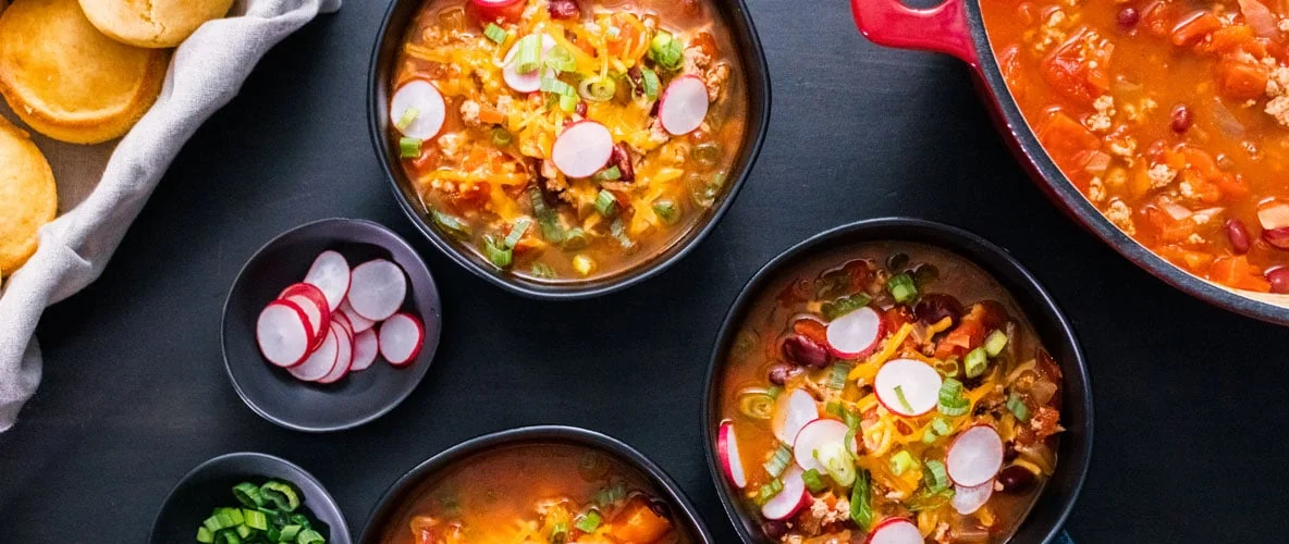Warm bowl of homemade soup on a table
