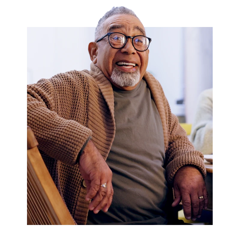 Senior in glasses smiling