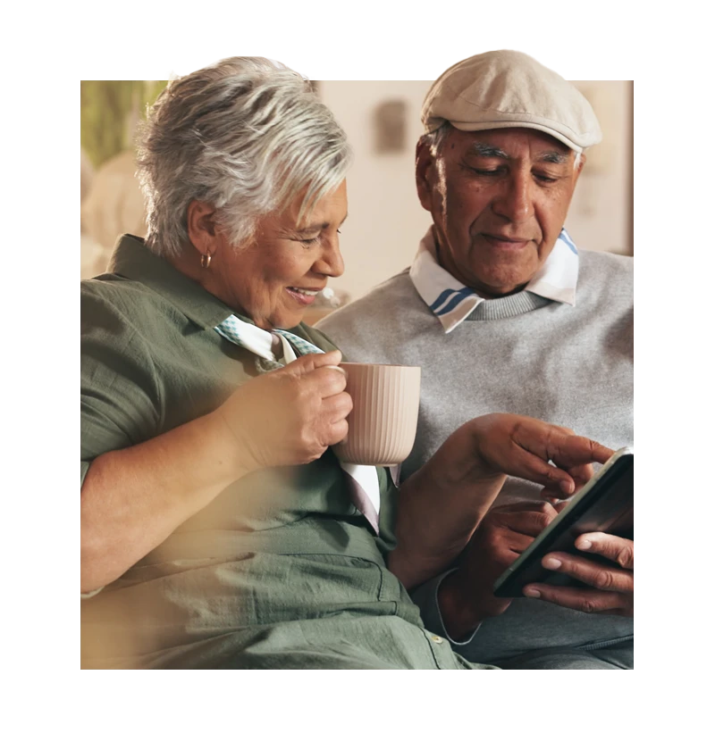 Seniors looking at tablet