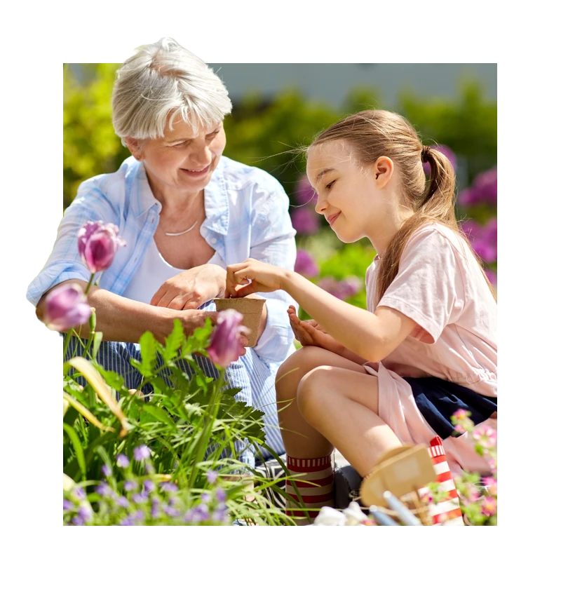 Senior gardening with grandchild